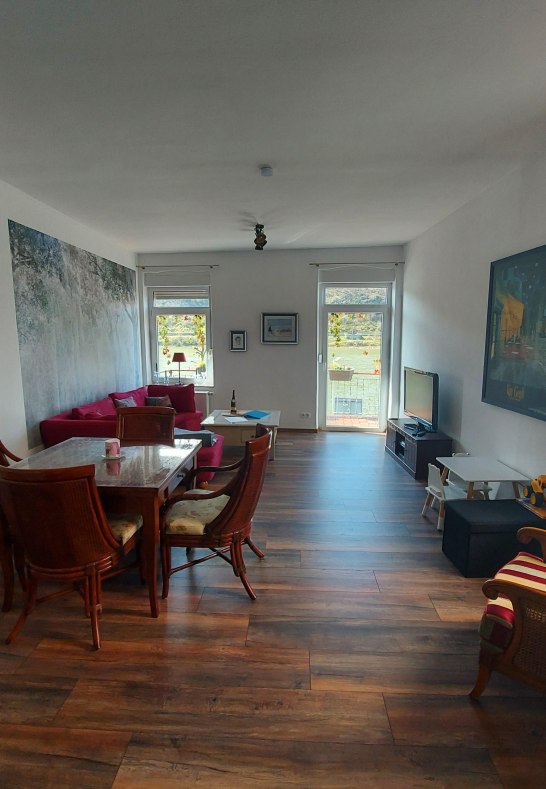 Sterrenberg living and dining room with wood stove | &copy; Heimes